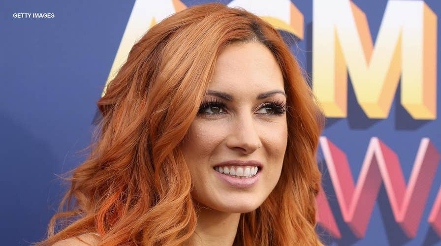 arielle mae gomez share becky lynch nip photos