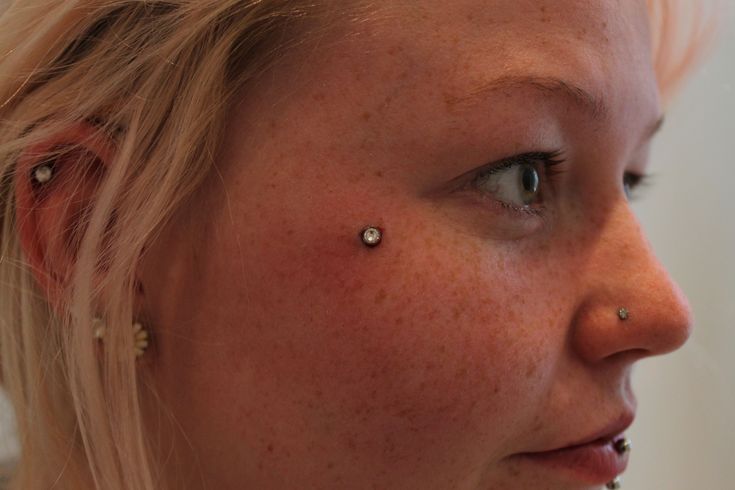 Best of Cheek bone piercing